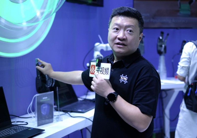 触觉增强世界模型引关注,一目科技IROS首秀定义机器人感知新维度(图1) 触觉增强世界模型引关注,一目科技IROS首秀定义机器人感知新维度(图1)